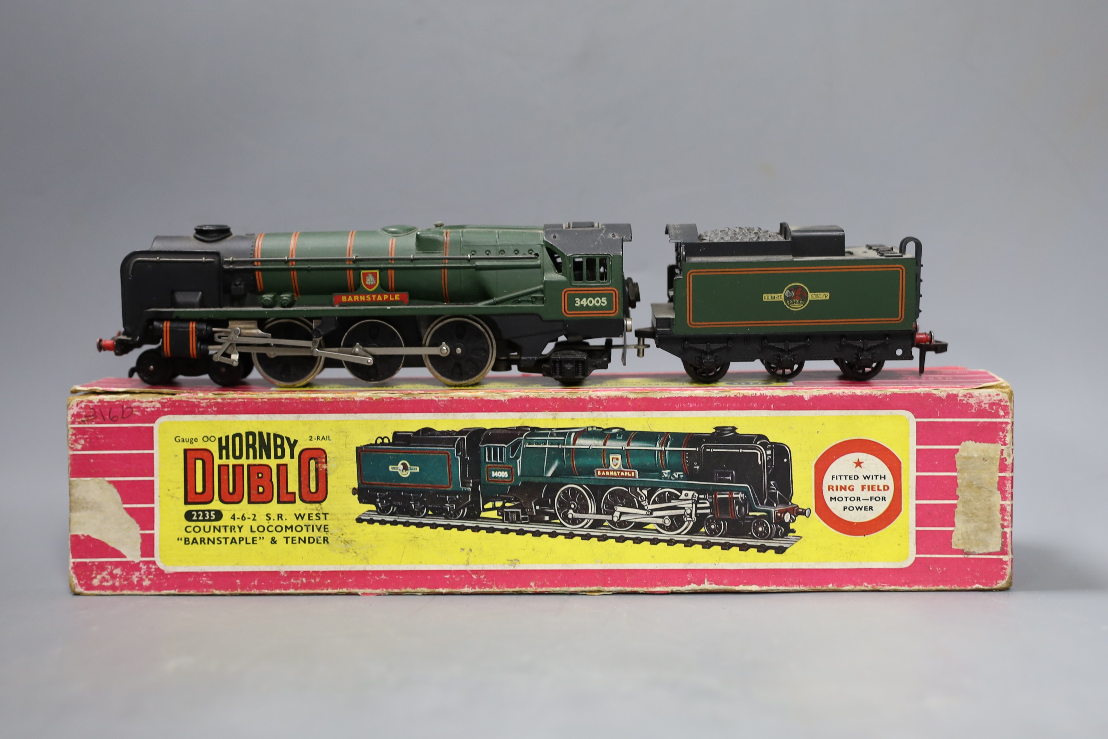 Three boxed Hornby Dublo locomotives and tenders – 2225 2-8-0 freight locomotive and tender, 2235 4-6-2 S.R. West country locomotive Barnstaple and tender and EDLT20 Bristol Castle and tender